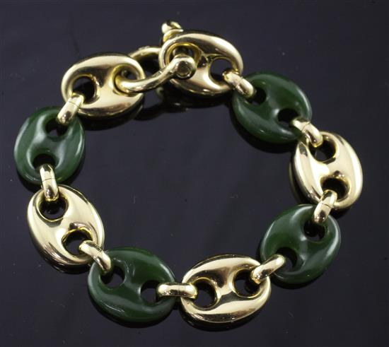 An 18ct gold and nephrite pierced oval link bracelet, approx. 7.5in.